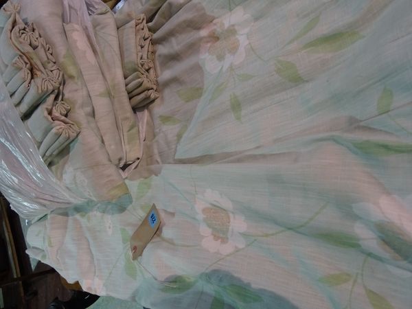 Two pairs of modern lined and interlined curtains with pale green floral decoration, each 70cm wide x 200cm long.   B3