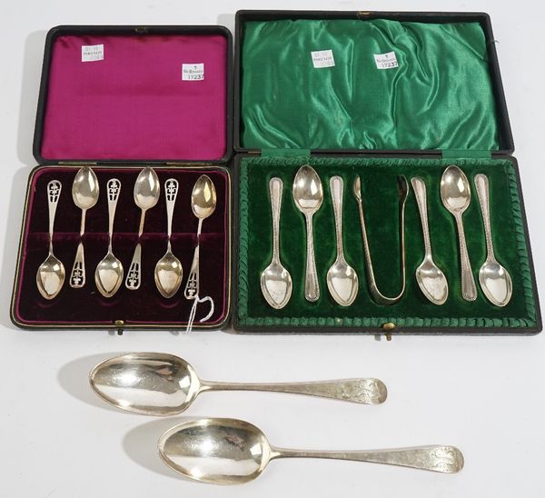 Silver, comprising; a set of six bead edged Old English pattern coffee spoons and a matching pair of sugar tongs, Birmingham 1906, cased, a set of six