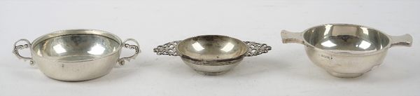 Silver, comprising; a twin handled quaich, Birmingham 1927, a twin handled bonbon dish, with pierced decoration to the handles, Birmingham 1906 and a