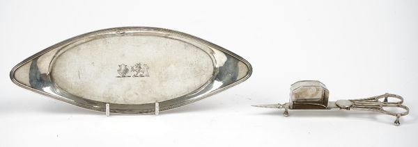 A pair of George III silver candle snuffers, of scissor action form, London 1801 and a George III silver candle snuffer's tray, of oval form, decorate