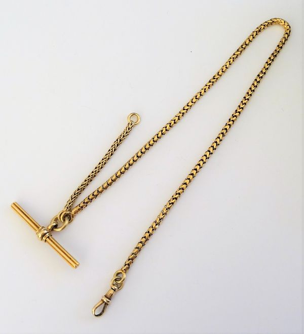 A French gold serpentine link watch Albert chain, fitted with a ridged T bar and with a swivel, gross weight 17.7 gms.