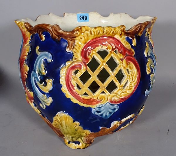 A 19th century Majolica jardiniere with pierced foliate decoration, 26cm high. CAB