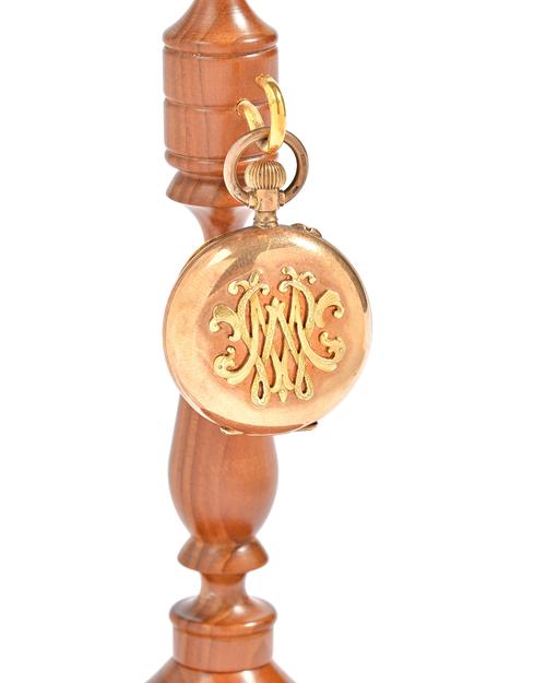 A lady's gold cased, keyless wind, hunting cased fob watch, with an unsigned jewelled lever movement, the inner and outer case detailed 56 14 K and to