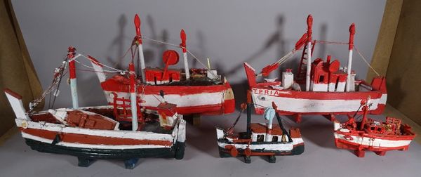 A group of eight 20th century scratch built and painted boats of various sizes, the largest 60cm wide, (8).  S4T