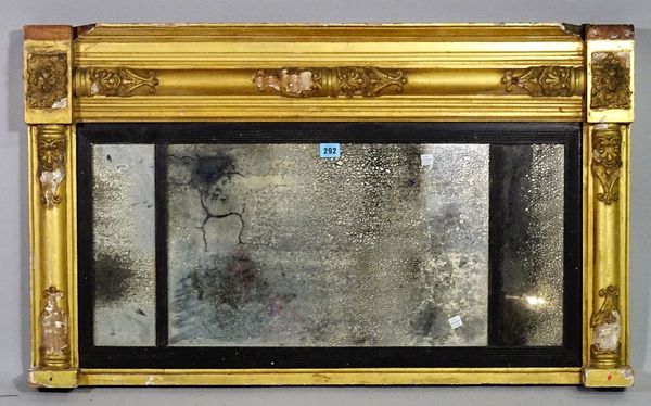 A Regency style gilt framed overmantel wall mirror, 97cm wide x 57cm high.  B5