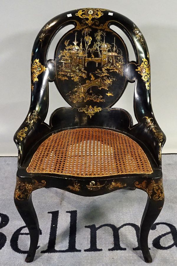 A late Victorian ebonised and mother of pearl inlaid side chair with cane seat, 57cm wide x 84cm high. D1