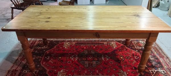 A Victorian style rectangular pitch pine table, on turned supports, 92cm wide x 191cm long. B5