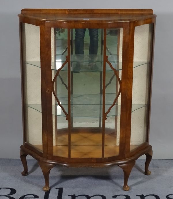 A 20th century walnut serpentine display cabinet on cabriole supports, 88cm wide x 116cm high. D2