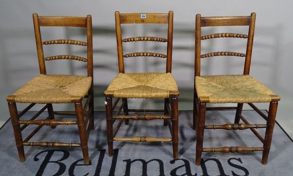 A set of six 19th century ash bar-back dining chairs, bobbin turned backs on turned supports and a pair of Edwardian inlaid mahogany side chairs on ta