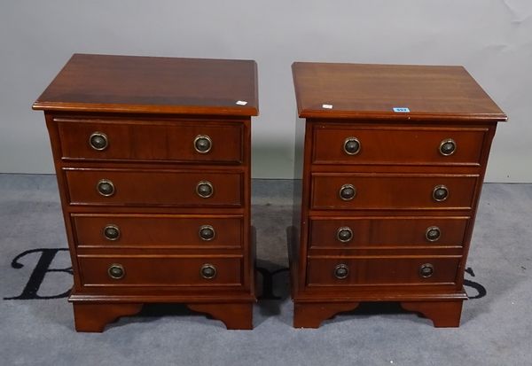 A pair of 20th century bedside chests of four long drawers, 43cm wide x 56cm high, (2).  C5