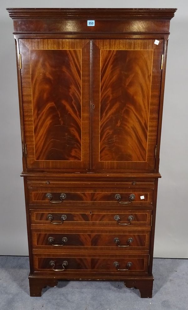 A Regency style mahogany linen press over four long drawers on bracket feet, 73cm wide x 152cm high.  C5