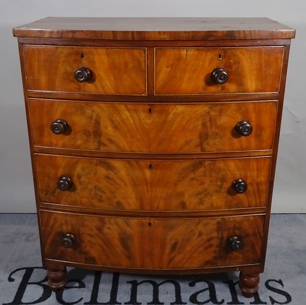 A Victorian mahogany bowfront chest of two short and three long drawers on turned supports, 96cm wide x 116cm high.  D5