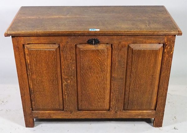 A small 17th century style oak coffer with raised panel decoration, 89cm wide x 63cm high.  C5