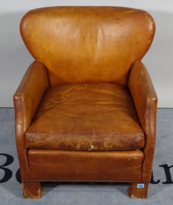 An early 20th century framed hardwood armchair with tan leather upholstery, 63cm wide x 70cm high.  C1