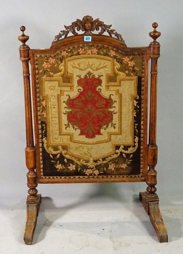 A Victorian mahogany framed fire screen 62cm wide x 100cm high and an Edwardian inlaid mahogany piano stool, 55cm wide x 65cm high, (2).  B1