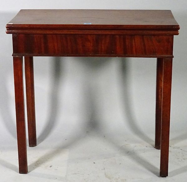 A George III mahogany foldover card table on square supports, 74cm wide x 73cm high. B2