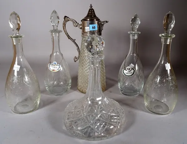 A late Victorian silver plated mounted cut glass claret jug, 36cm high, two pairs of decanters, 34cm high and another, (6).  S1T