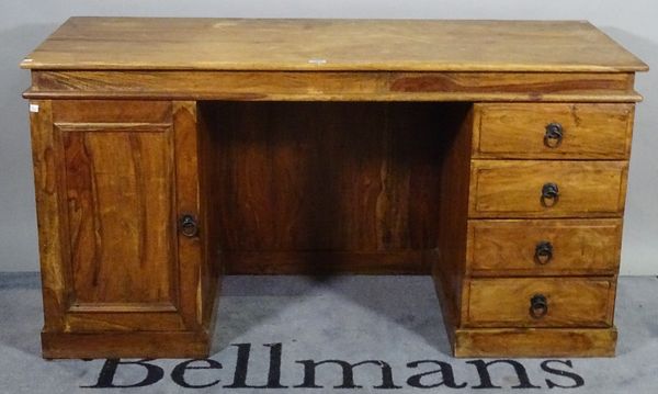 A 20th century hardwood pedestal desk with four drawers and cupboard, 150cm wide x 78cm high. B3