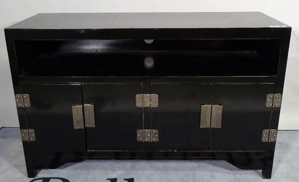 A 20th century black lacquer side cupboard with four door base, 120cm wide x 77cm high, and a 20th century black painted faux bamboo open bookcase, 13