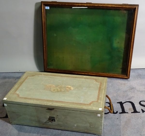 An early 20th century blue painted lift top trunk, 70cm wide x 25cm high and an early 20th century pine lift top display case, 91cm wide x 14cm high,