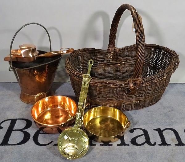 A large 20th century wicker log basket and a quantity of copper and brassware, (qty).   B1