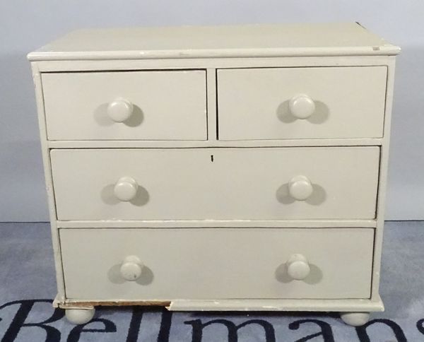 A late Victorian grey painted pine chest of three long drawers on bun feet, 87cm wide x 77cm high.  D5