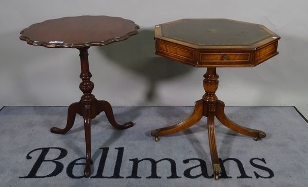 A late Victorian mahogany tripod table, 58cm wide x 68cm high and a 20th century mahogany octagonal drum table with leather inset top with four drawer