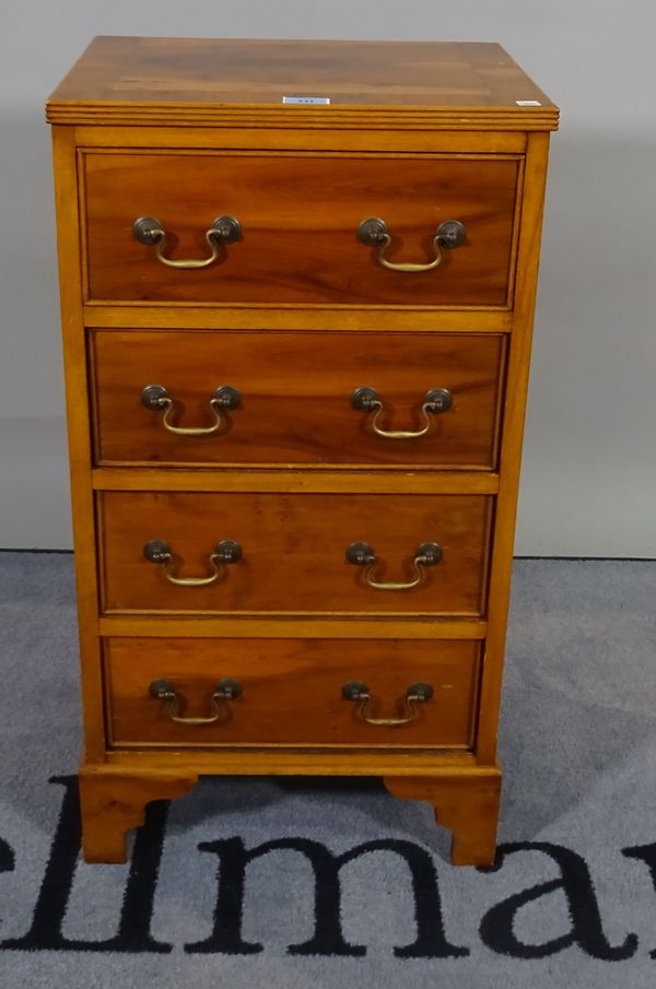 A 20th century yew wood chest of four short drawers on bracket feet, 41cm wide x 79cm high.  D5