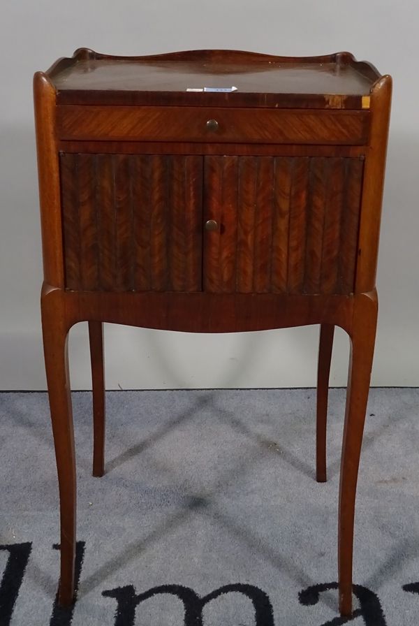 A 19th century Continental walnut and mahogany bedside table with single drawer over cupboard on cabriole supports.  D5