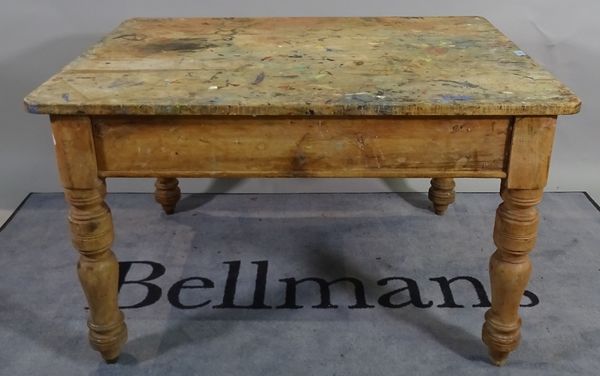 An early 20th century pine low table on ring turned supports, 114cm wide x 68cm high.  C5