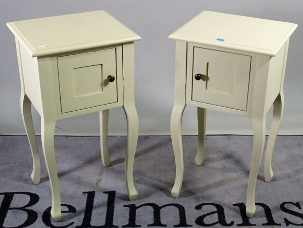 A pair of 20th century white painted bedside cupboards, 38cm wide x 70cm high, (2).  B2