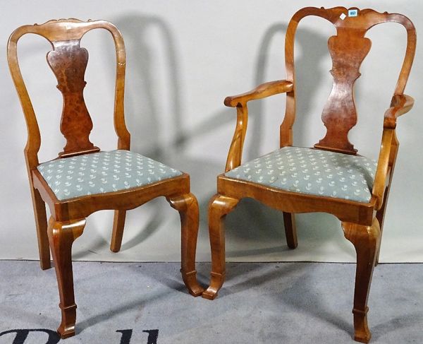 A set of eight 18th century style walnut vase back dining chairs, to include two carvers, 55cm wide x 96cm high, (8).  A4