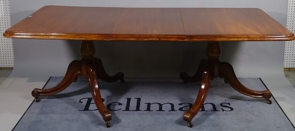 A late Victorian mahogany 'D' end dining table with one extra leaf, on outswept supports, 152cm wide x 73cm high x 203cm fully extended.  A4