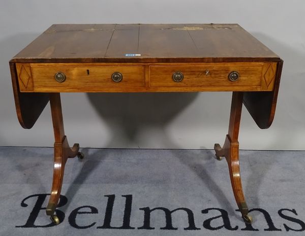 A Regency rosewood sofa table, with two real and two opposing drawers, on rectangular section end supports, 154cm wide open x 74cm high.  D3