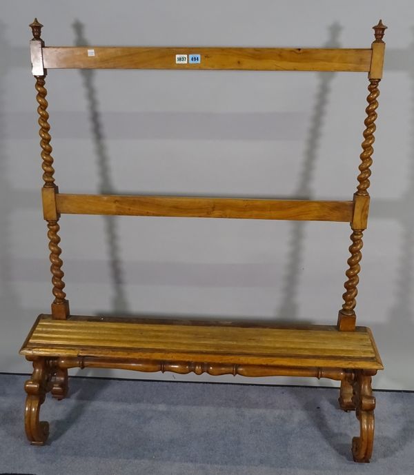 A Victorian walnut stand with barleytwist supports and scroll feet, 110cm wide x 127cm high. B4