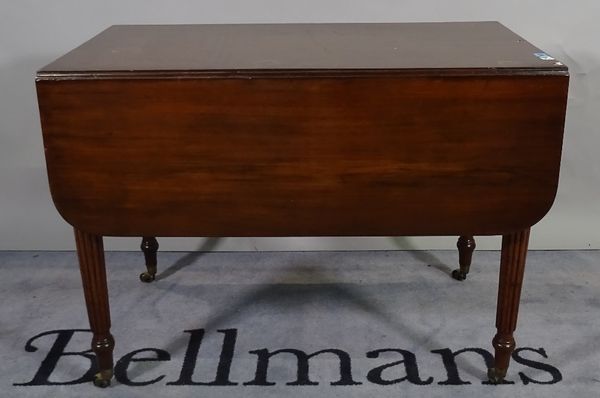 A Regency mahogany Pembroke table with single frieze drawer on reeded supports, 99cm wide x 74cm high. A1