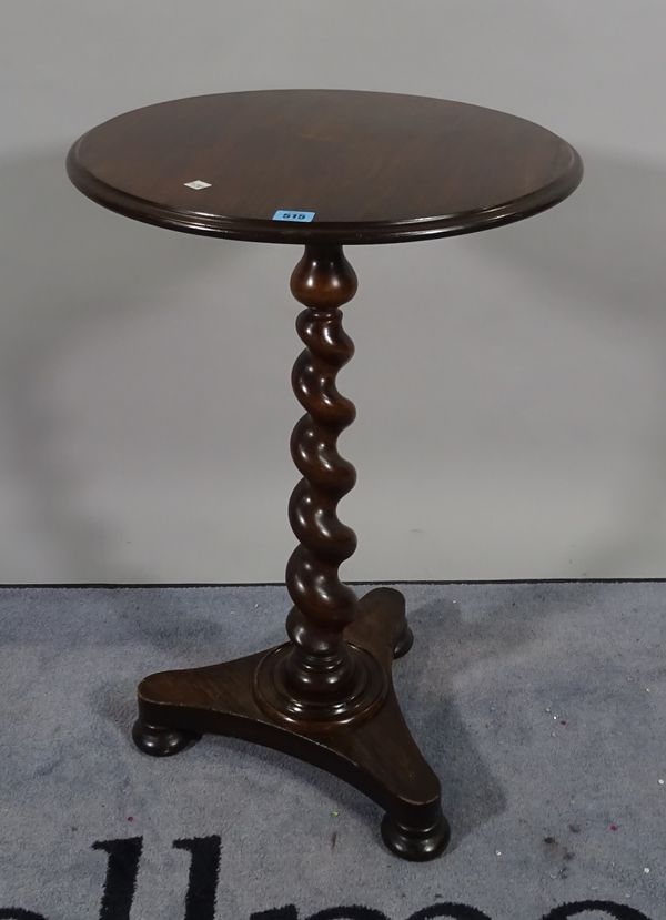 A 19th century mahogany occasional table, the circular top on barley twist column and triform platform, 57cm diameter x 74cm high. C1