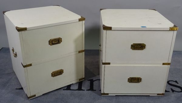 A pair of 20th century white painted campaign style two drawer bedside tables, 45cm wide x 52cm high.  D5