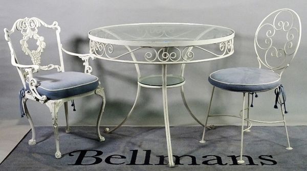 A 20th century white painted metal garden table, with circular glass inset top, 92cm diameter, together with four chairs, (5).  B1