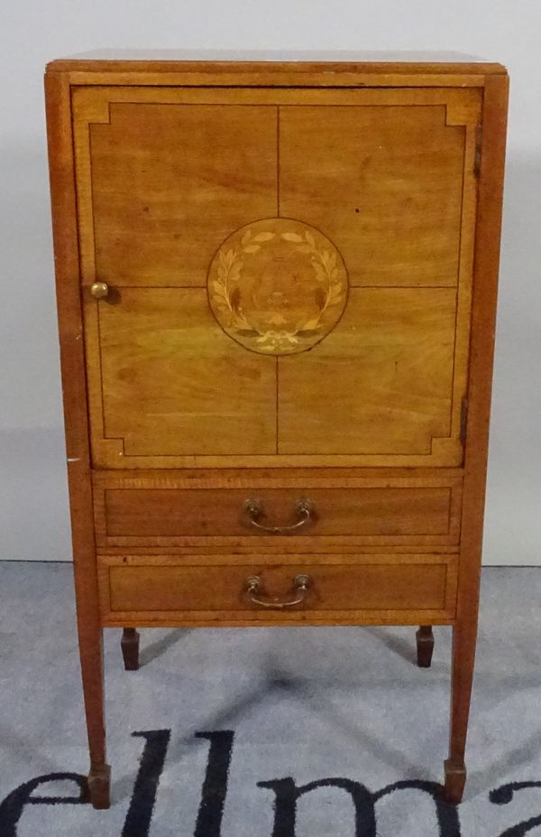 An early 19th century marquetry inlaid fruitwood music cabinet, on tapering square supports, 46cm wide x 88cm high.  D5