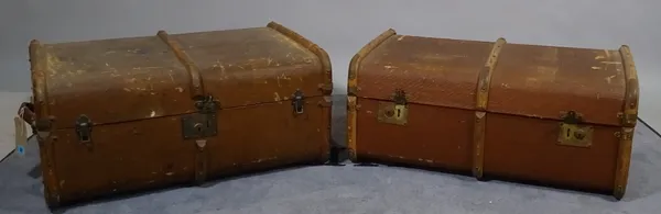 Two early 20th century canvas and Bentwood travelling suitcases, 76cm wide x 34cm high and an early 20th century leather suitcase, 75cm wide x 24cm hi