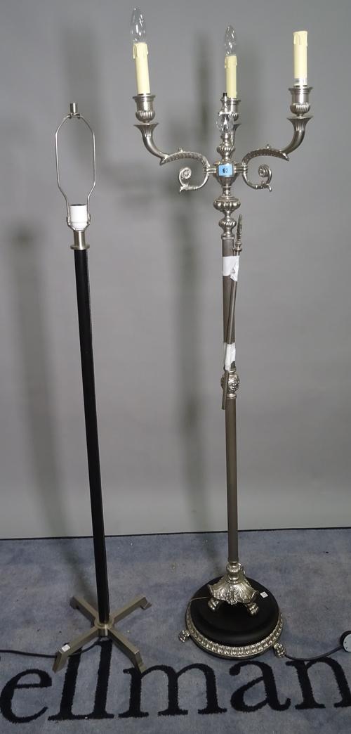A Regency style silvered metal three light standard lamp on ebonised plinth base, 160cm high and a modern chrome and leather upholstered standard lamp