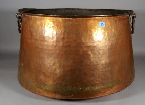 An early 20th century large Middle Eastern copper cooking pot, 62cm diameter x 40cm high.  D4