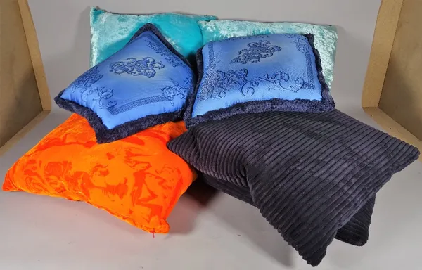 Versace; a pair of blue silk cushions, 40cm wide, three velvet cushions each 50cm wide and another pair, 47cm wide, (7).  B5