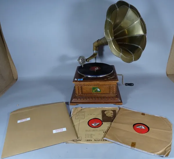 A 20th century gramophone and three records, 35cm wide x 62cm high.   B2