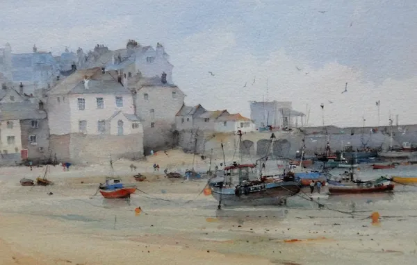 D** H** (20th/21st century), Fishing village with beached boats at low tide, watercolour, indistinctly signed, 22.5cm x 33.5cm.