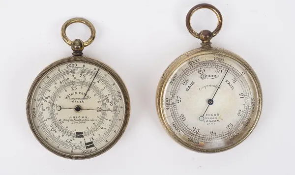 An early 20th century brass cased pocket barometer/compass compendium by J. Hicks, LONDON, in a double sided leather case (4.7cm diameter) and another