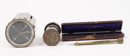 A gilt brass surveyors Equerre (18cm), a WW2 cockpit lamp Mk2, and a brass cased compass by Highes and Son Ltd. (3).