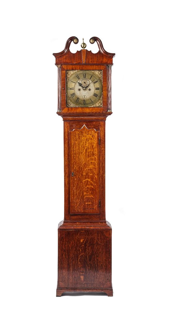 An oak longcased clock, 19th century with broken arch pediment to the square hood, brass dial with subsidiary seconds dial and date aperture, with two