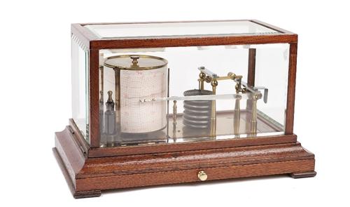 A 20th century oak cased barograph, un-signed, in a glazed rectangular case with frieze drawer to the base, 36cm wide.